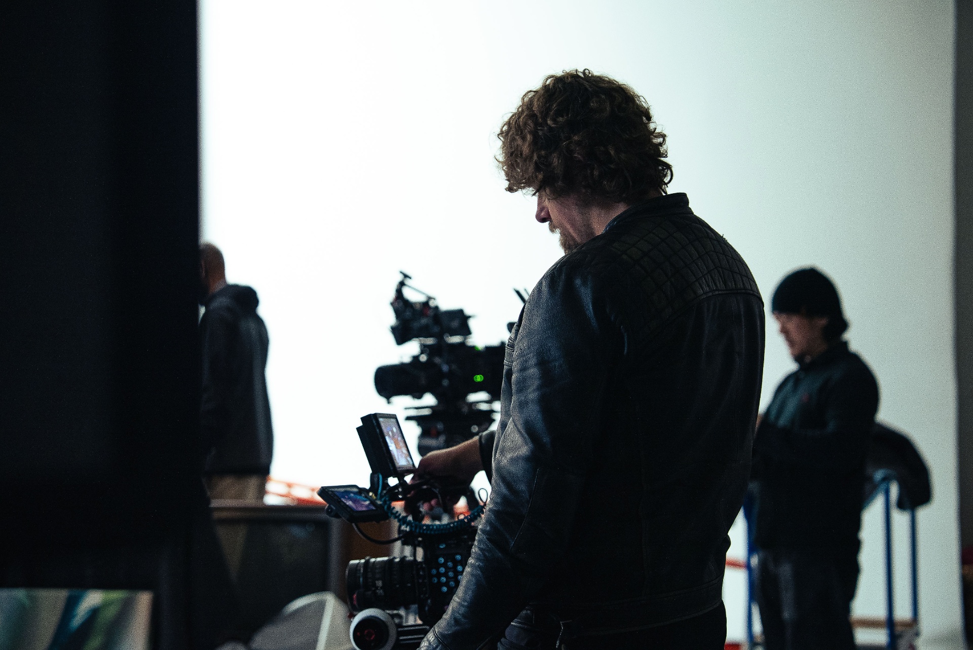 Behind the lens